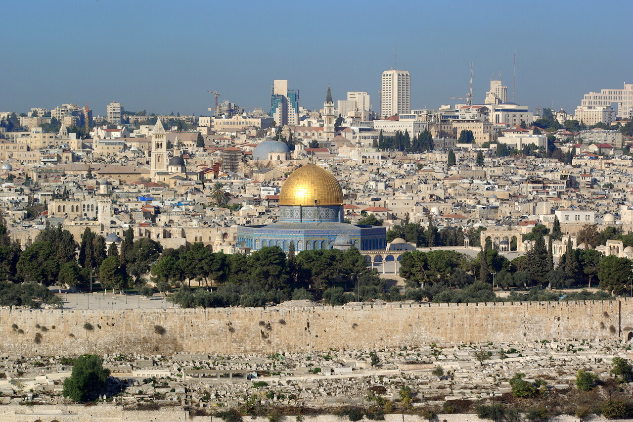 The golden Dome of the Rock above the walls of Jerusalem's Old City, seen from the Mount of Olives